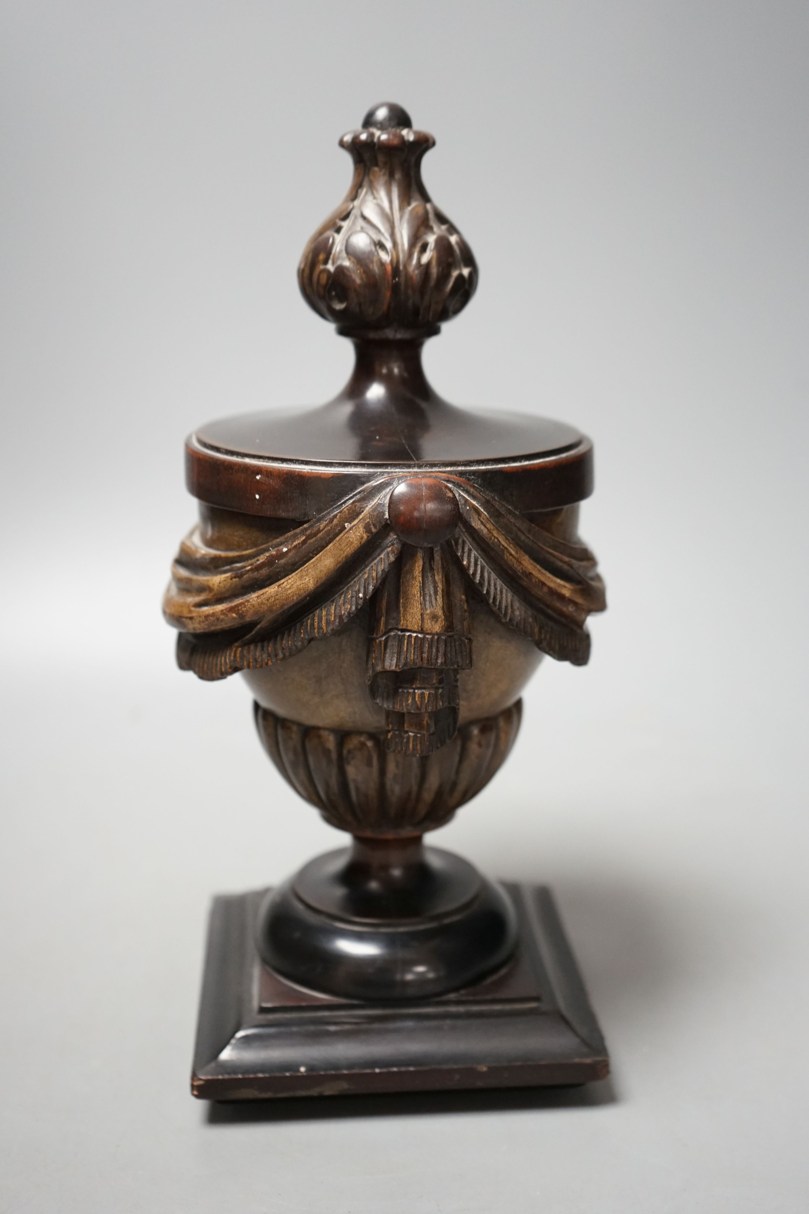 E. H. Pinto collection - a 19th century painted treen neo classical urn, 28cms high.